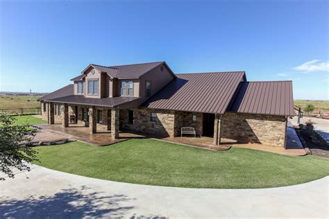 brown brick house with metal roof|metal roof on brick ranch.